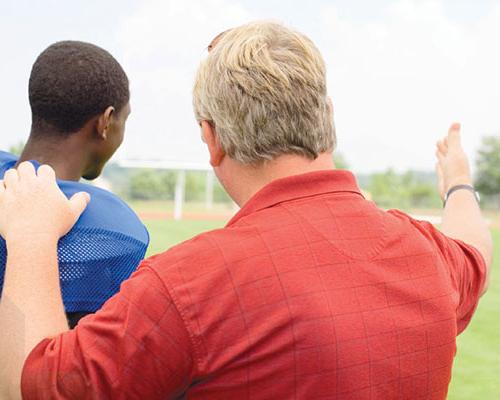 Coach Talks to Player